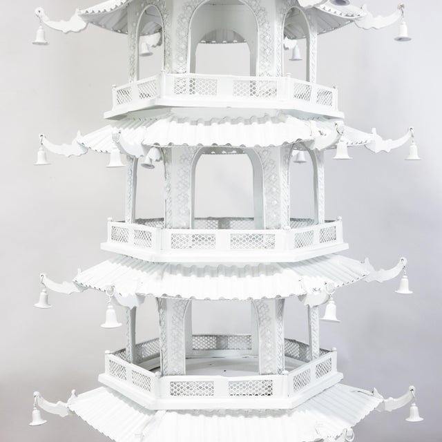 This large-scale Chinoiserie pagoda tower showcases exquisite vintage craftsmanship rendered in a crisp, monochromatic...