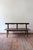 A 19th-century French country bench in solid wood, from the vernacular tradition of rural furniture: made by a village...