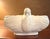 The Hull Pottery Open Rose Console Bowl with Dove Handles is a rare vintage piece from the mid-20th century, featuring a...