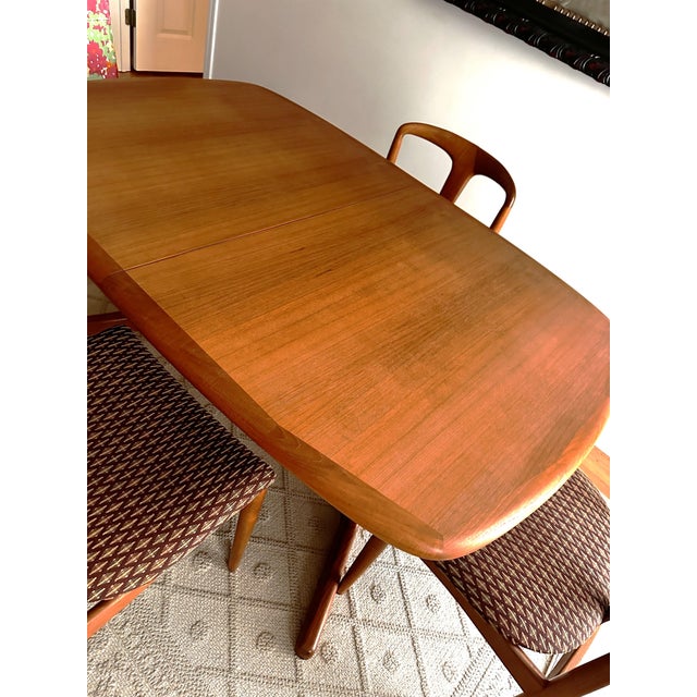 Diethelm Scanstyle solid teak clean Danish modern lines draw leaf table and 4 chairs. Made in Denmark by high quality...