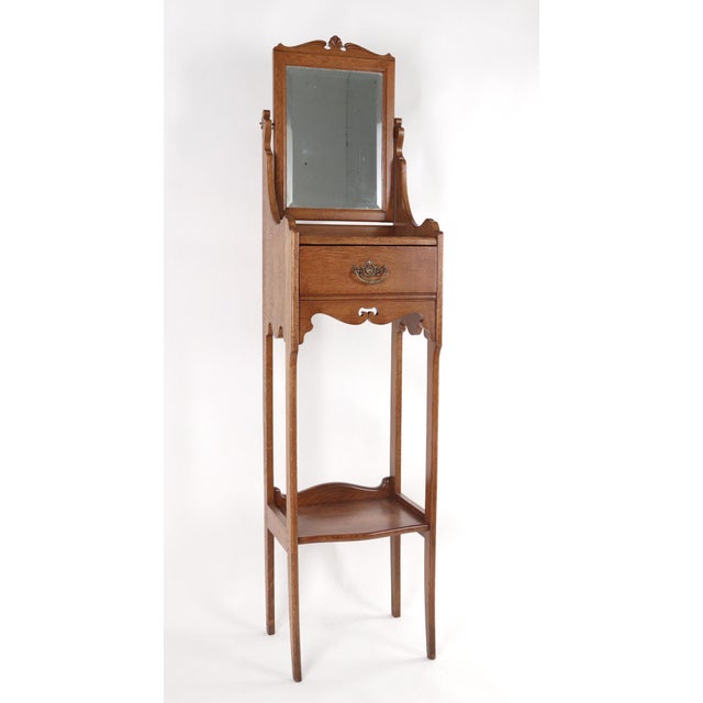 Victorian oak wood shaving stand, complete with a stretcher shelf and dovetailed drawer for storage and a tilt mount...