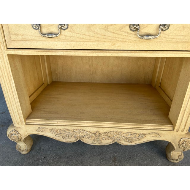 Marge Carson has created an elegant nightstand with just the right amount embellishment. Oak wood produced in a Sun...
