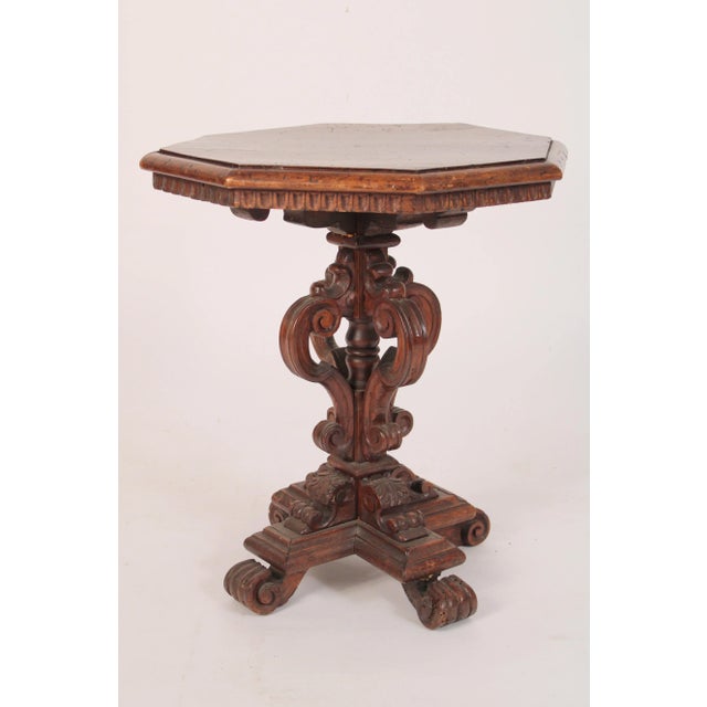 Italian baroque style walnut occasional table, made from antique and later elements, assembled circa 1930's. With an...