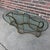 This is a stunning 1970s brass and glass Mastercraft Racetrack coffee table.