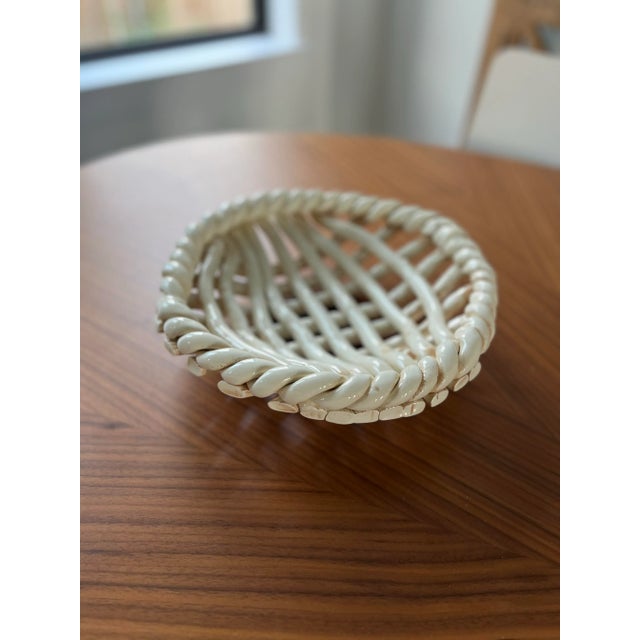 Showcase this handcrafted, vintage, decorative bowl front and center. Filled with fruit, or on its own, this rustic beauty...