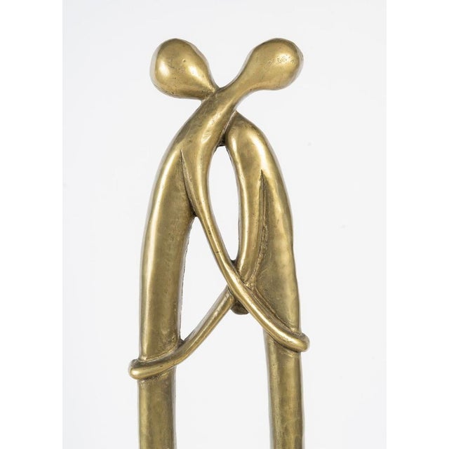 Patina-finished bronze sculpture with a granite base, circa 1950, 20th century. 20th-century patina-finished bronze...