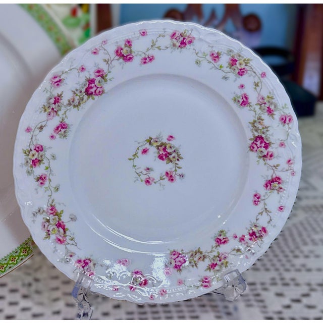 Three (3) Théodore Haviland Limoges France Porcelain Plates – Floral Scalloped Elegance. Measuring 7 1/2”, they can be...