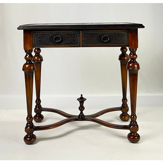A stunning and rare table attributed to Theodore Alexander’s celebrated Armoury Collection. Inspired by the defensive...