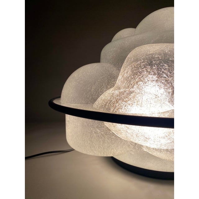 Illuminate your space with a masterpiece of Italian design: the Profiterolle lamp, designed by the esteemed Sergio Asti in...
