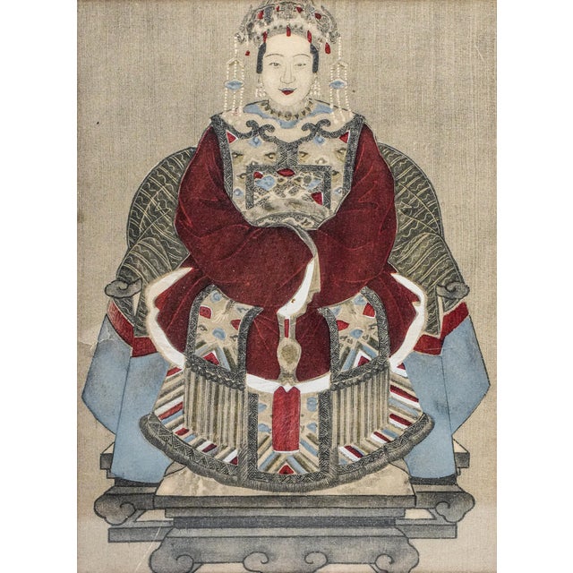 A richly detailed and evocative hand-painted 19th-century Chinese ancestral portrait, capturing the dignified presence of...