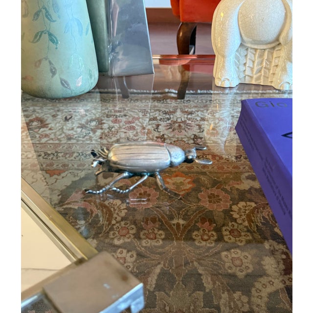 Silver insect shaped ashtray, box France 1950s Marked 800 under the base H 5 cm x 14 × 9 cm Conditions: excellent...