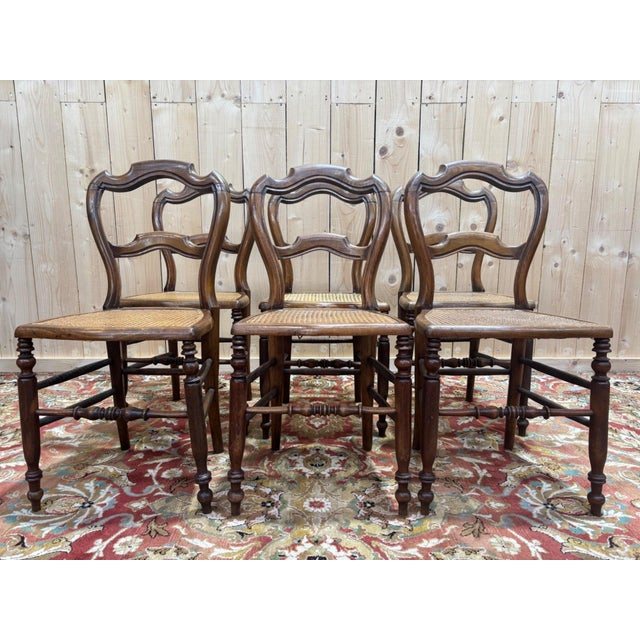Magnificent set of six Louis-Philippe chairs in solid walnut, dating from around 1840-1860. These chairs combine the...