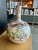 This mid-century studio art pottery bottle vase was designed and handmade by ceramicist Polia Pillin circa 1950. Crafted...