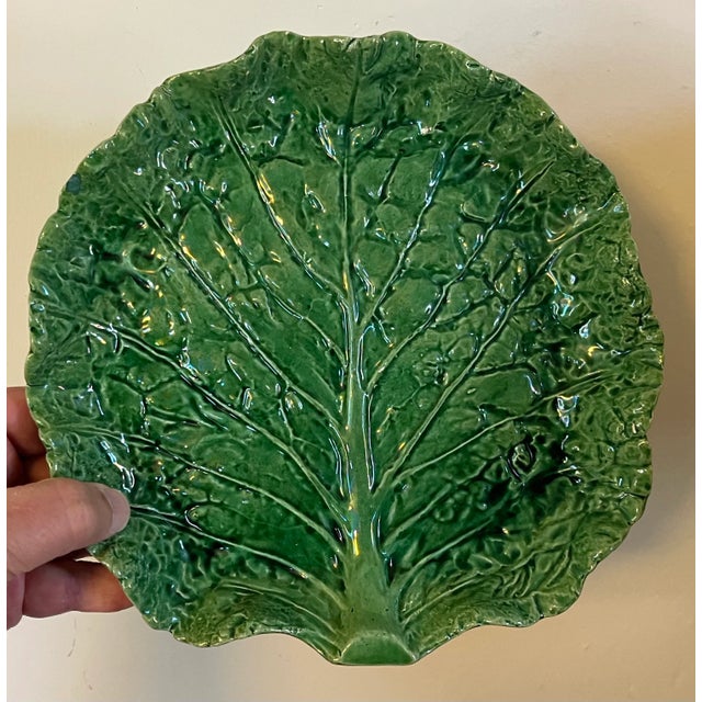 Antique Portuguese majolica pottery green glazed cabbage or lettuce leaf serving dish. Naturalistically molded with...