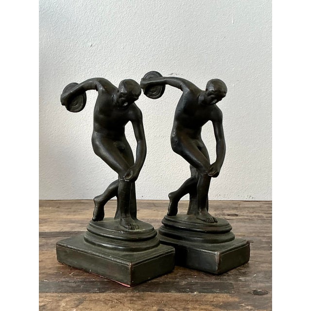 Elevate your library or executive study with this striking pair of vintage cast brass bookends, masterfully modeled after...