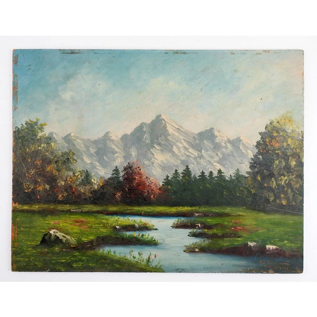 Circa 1920's oil on masonite impressionist landscape with mountains and lake. Signed illegibly lower right corner....
