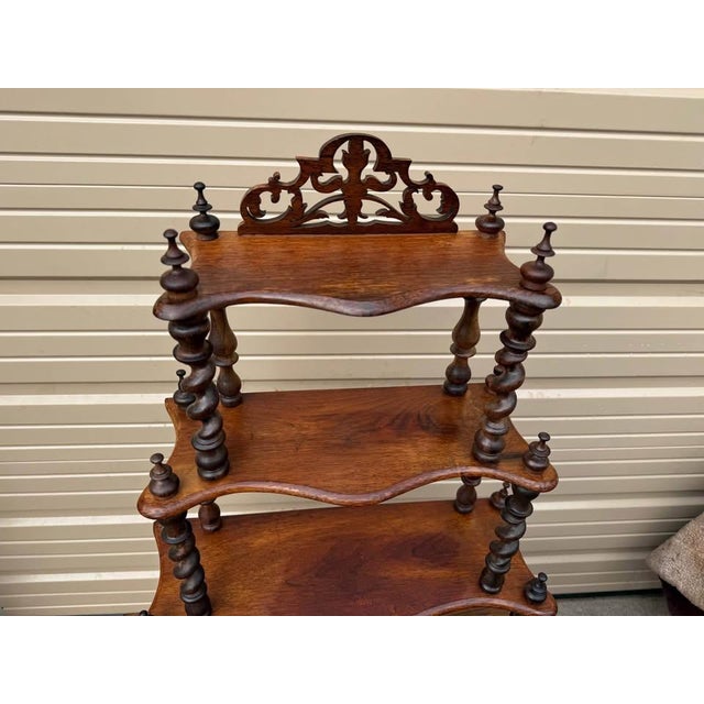 Antique Victorian English Style Walnut and Mahogany O Display Stand Etagere Curio Bookshelf Fantastically carved, this...