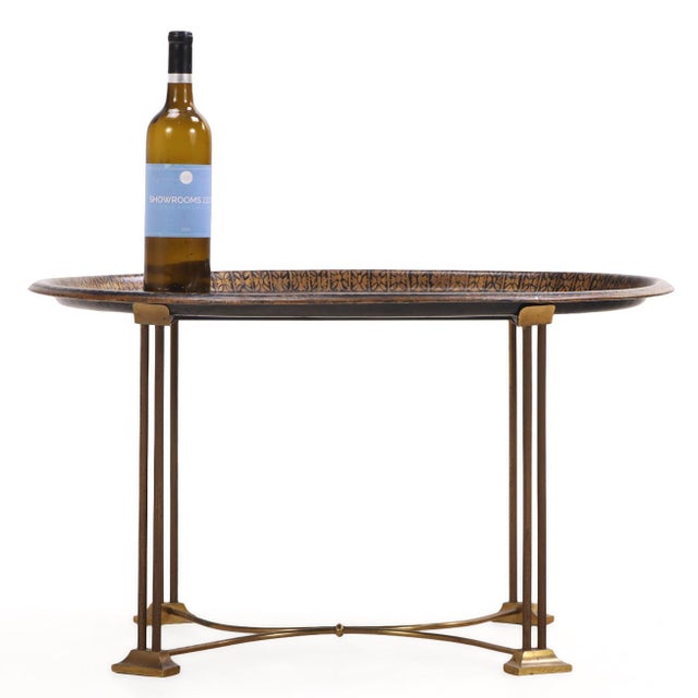 Here we have a unique toile tray top table featuring a beautifully patinaed provincial scene hailing from the 1940's....