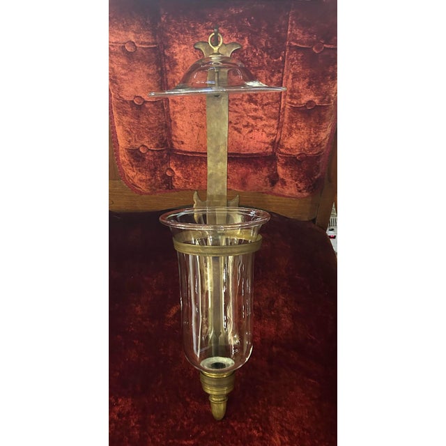 What a stunning pair of vintage, brass and hand-blown hurricane, wall sconces, with their smoke bells. I wish that I had...