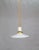 A contemporary pendant light with a rope-covered cord, small milk glass saucer shade, and ceramic and brass canopy....
