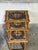 This set of three nesting tables features a convenient space-saving design. Each piece showcases striking ceramic tile...