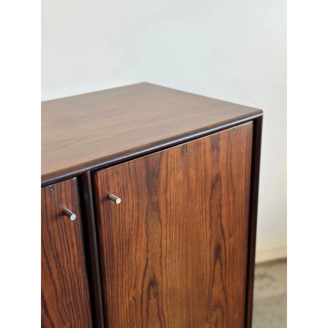 W39.5 D19 H53.5 Vintage rosewood armoire in fully restored condition. Unit has been refinished inside and out. Armoire...