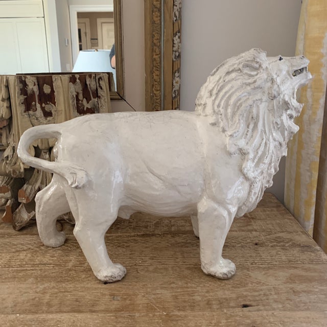 Signed White Glazed Pottery Lion Sculpture. Illegibly signed. Heavy. Unique and a special hand crafted a sculpture.