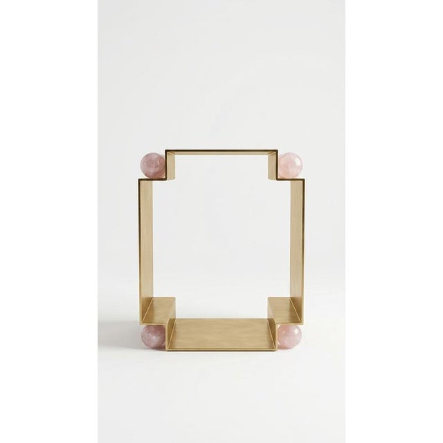 Milanese side table, brass and rose quartz, by auste ost dimensions: w 40 x d 30 x h 50 cm materials: brass, rose quartz....