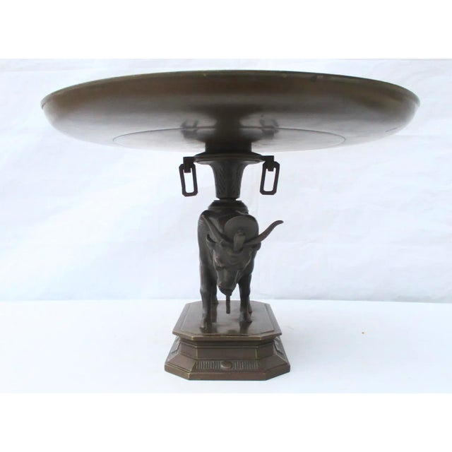 Egyptian revival bronze Tazza of hieroglyphics and Egyptian deities surrounding the head of Pharoh. Carried on the back of...