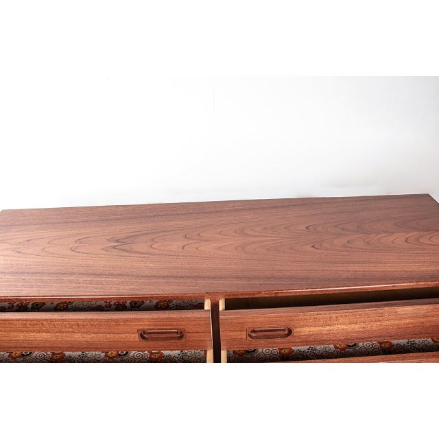 Large Danish Double Chest of 8 Drawers in Teak from Dyrlund, 1960s, in Flawless conditions. Designed 1960 to 1969 This...