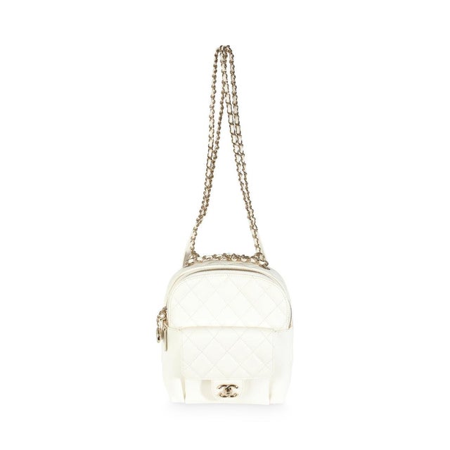 Item #: 141334 Interior Material: Fabric Size: Small Features Interior: One slip pocket Dimensions: 6.5 x 7.25 x 2 in...
