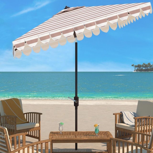 The stylish beige and white stripes and scalloped detail of this chic Vienna Umbrella fashionably elevates the art of...