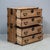 Early 1900's Japanese kimono chest made in two sections of kiri wood (paulownia). The four drawers slide easily and...