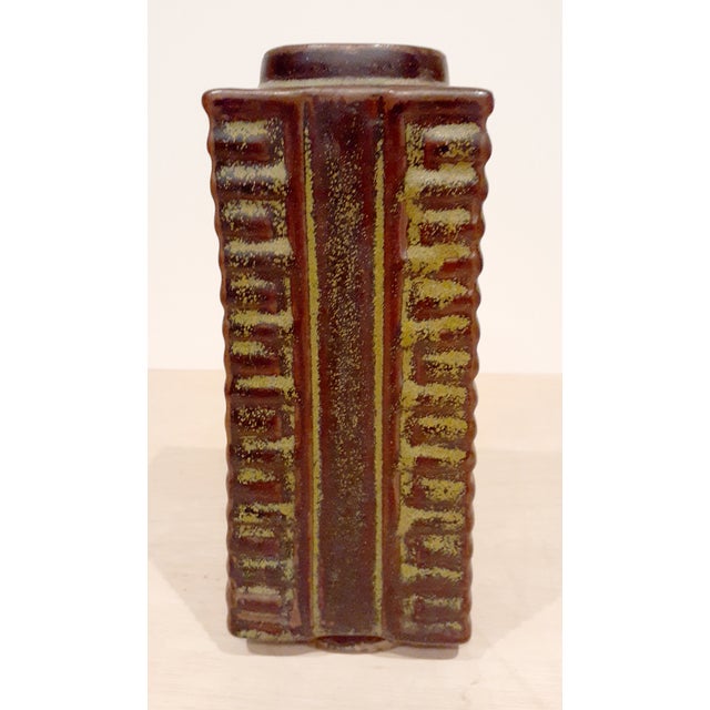 Chinese porcelain tri-color cong, a finely formed cong wiht a square shape body and round shaped neck and foot. The...