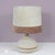 This striking 1970s French table lamp showcases a distinctive suede-upholstered base and hood, reflecting the era’s...