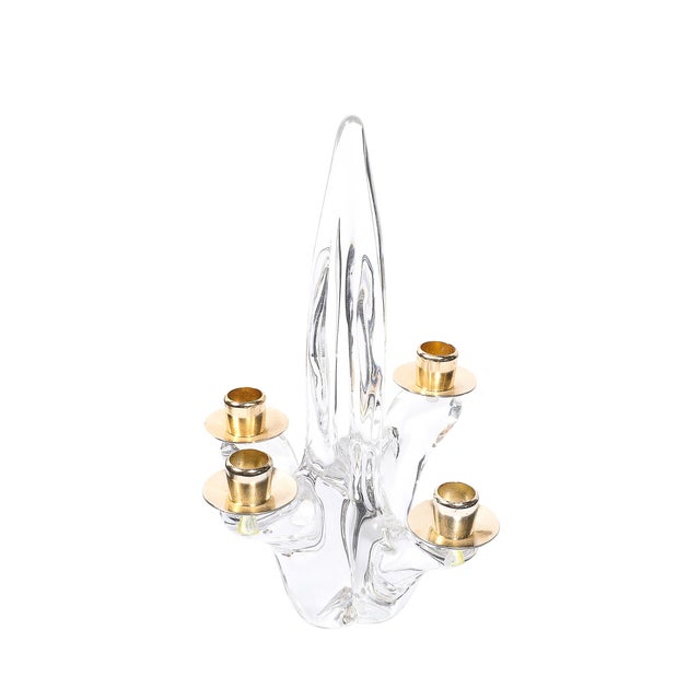 This pair of mid-century amorphic four-arm candelabra, signed Schneider, is a stunning example of French elegance and...