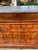Showcasing stunning flame mahogany veneers with exceptional bookmatched grain, this 19th-century French Louis Philippe...