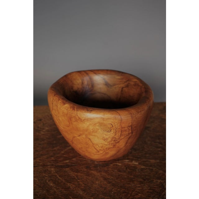 A nice sculpted bowl in olivewood. The bowl has a good strong presence. Some wear to the inside but overall in very good...