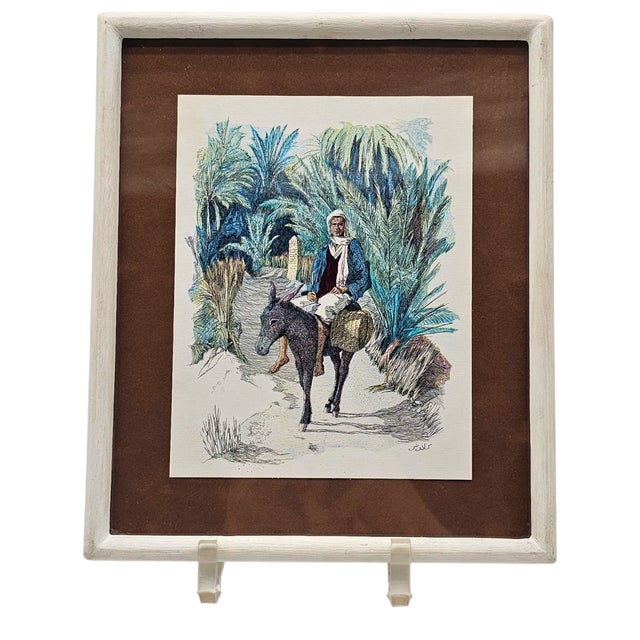 Evocative of 1960s travel culture, this pair of Moroccan hand-colored prints captures desert life and the Marrakesh...