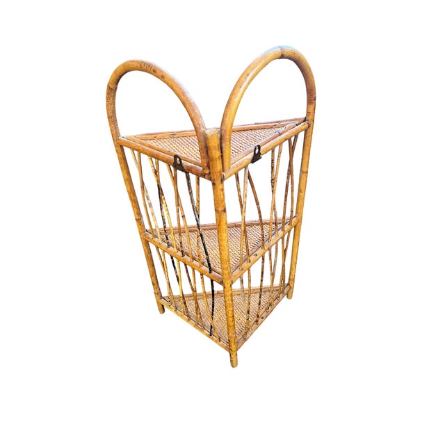Beautiful burnt Bamboo Italian made corner shelf, mid-century modern Measures 14 inches across the front 24 1/4 inches...