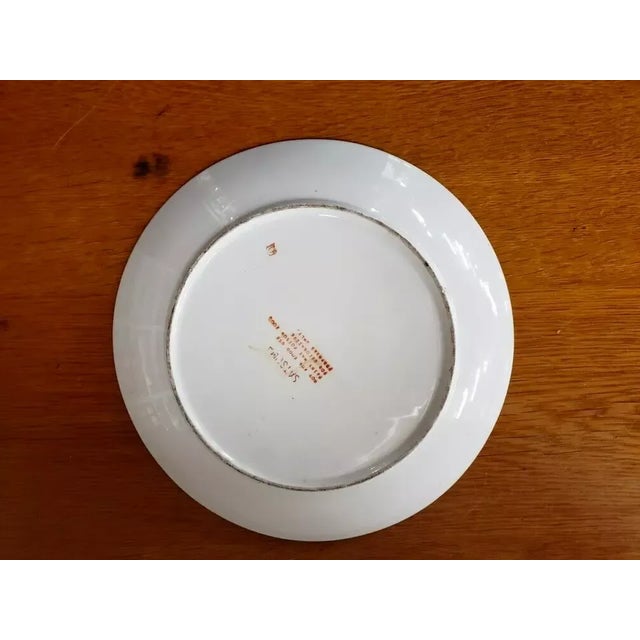 This is a Vintage Satsuma Decorative Porcelain Chinese Plate with Bird and Floral Motif. It measures 1 1/8" high and 10...