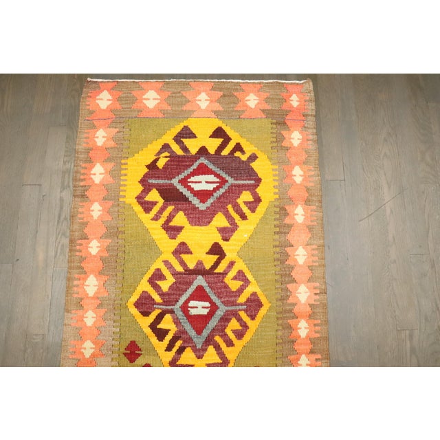 a vibrant mid-20th-century Turkish Kilim Details rug no. j4666 size 2' 3" x 4' 2" (69 x 127 cm)