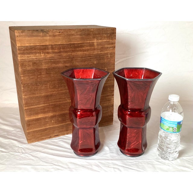 A pair of Japanese pigeon blood enamel cloisonné beaker vases with original storage wood box. The hexagonal shape with...