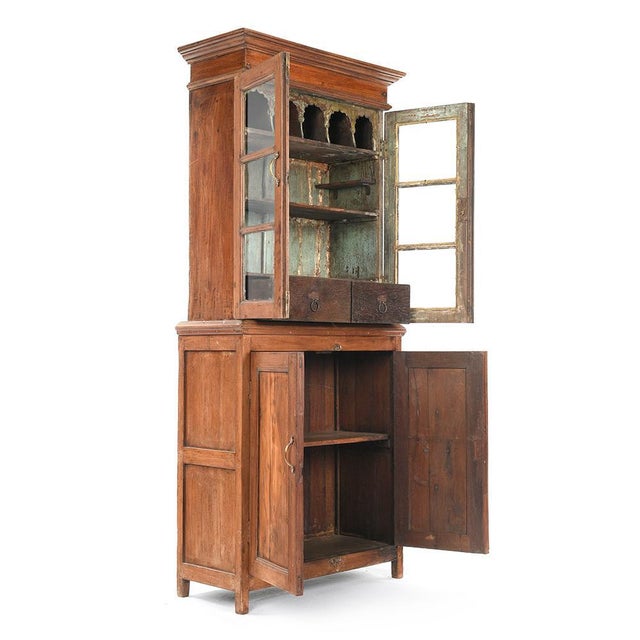 Glazed Wooden China Cabinet, in Very Good conditions. This piece is designed in the style of the selected designer and/or...