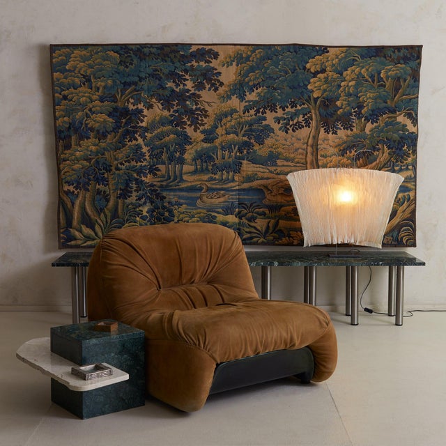 A composition of elemental form, this 1970s Italian side table reads as sculpture first, function second. Anchoring the...