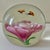 Beautiful and intriguing glass paperweight with pollinators appearing to fly suspended above a pink flower. Please see...