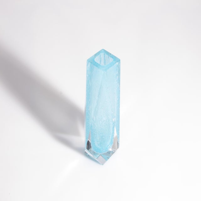 Indulge in the exquisite elegance of this Murano vase, a true testament to Venetian craftsmanship. Hand-blown by master...