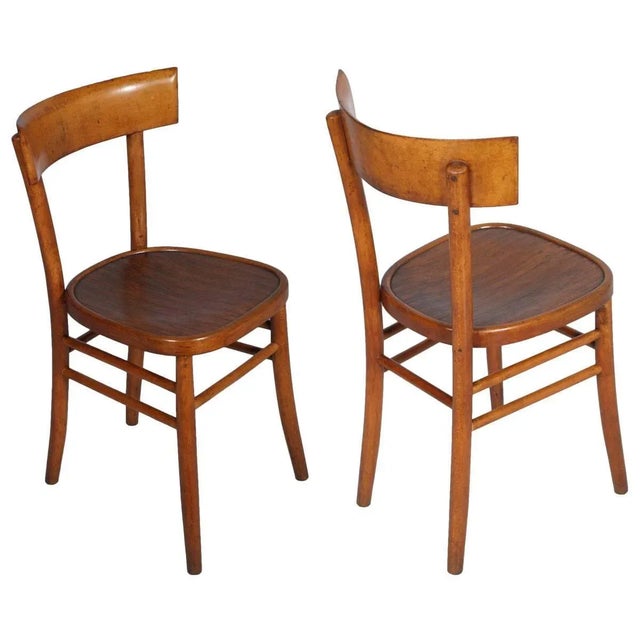 This set of six mid-century modern chairs was produced by ISA Bergamo. The chairs are made of shaped beech which has been...