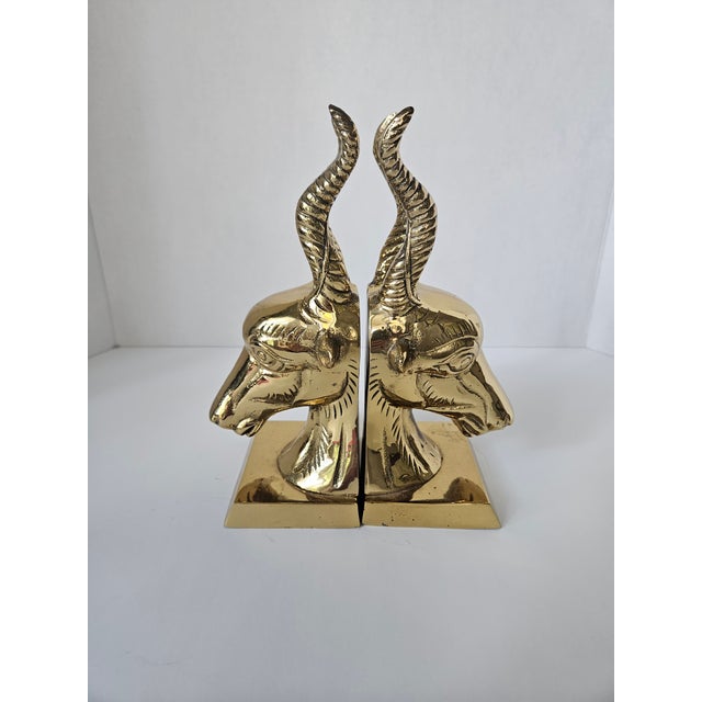 Striking brass bookends will light up your office shelf with their rich polished gold color. Highly reflective and...