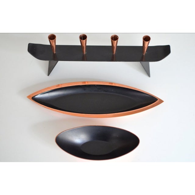 This three-piece copper set was designed by Gunnar Ander in the 1960s and manufactured by Ystad Metal in Sweden. It...